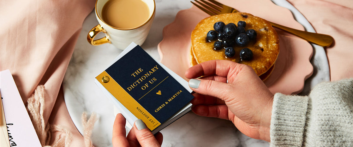 Martha Brook Personalised Dictionary of Us with a cup of tea and a stack of pancakes