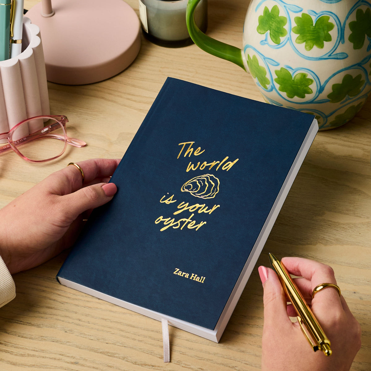 Martha brook personalised stationery personalised leaving gift vegan leather notebook teal notebook with gold foil reading 'the world is your oyster'