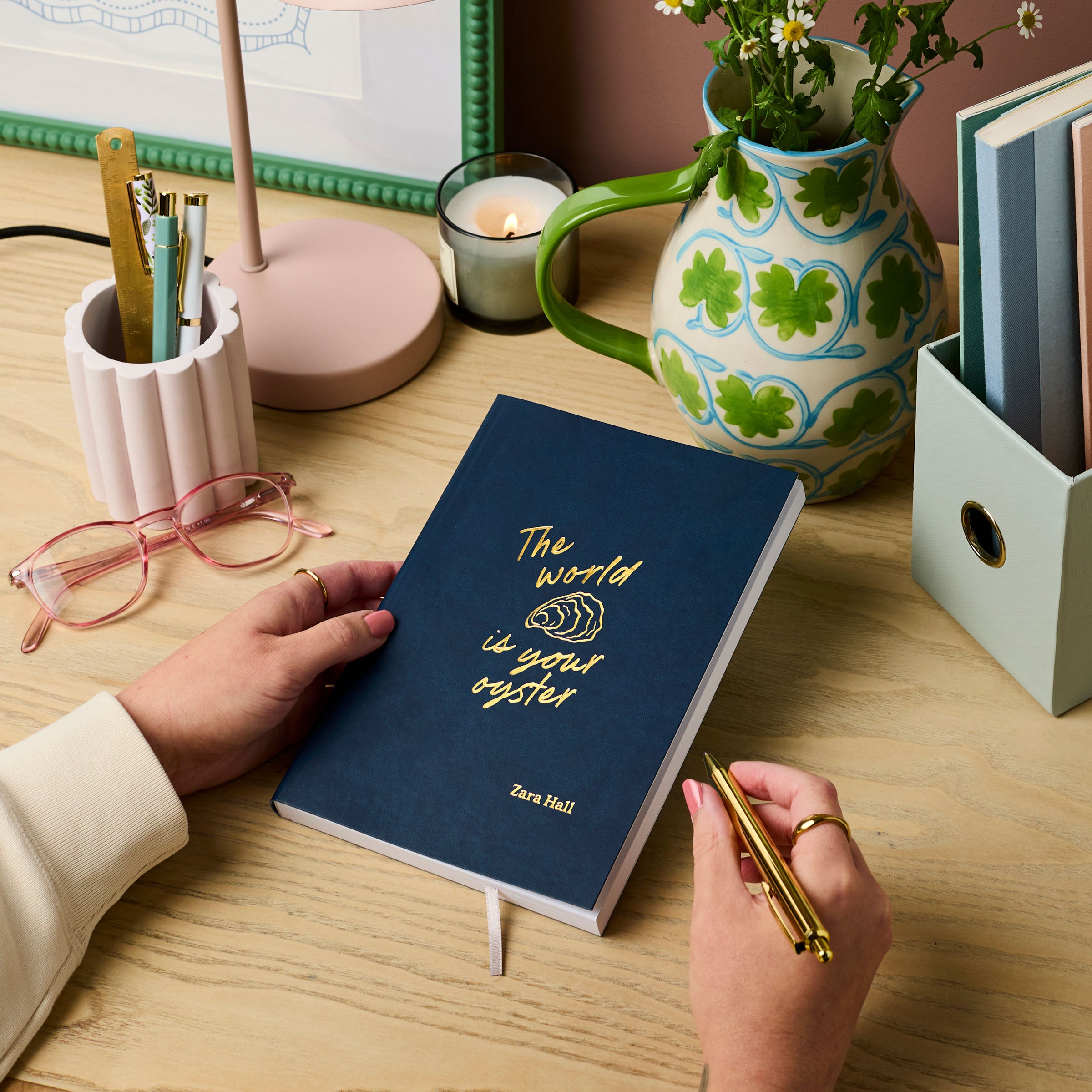 Martha brook personalised stationery personalised leaving gift vegan leather notebook navy notebook with gold foil reading 'the world is your oyster'