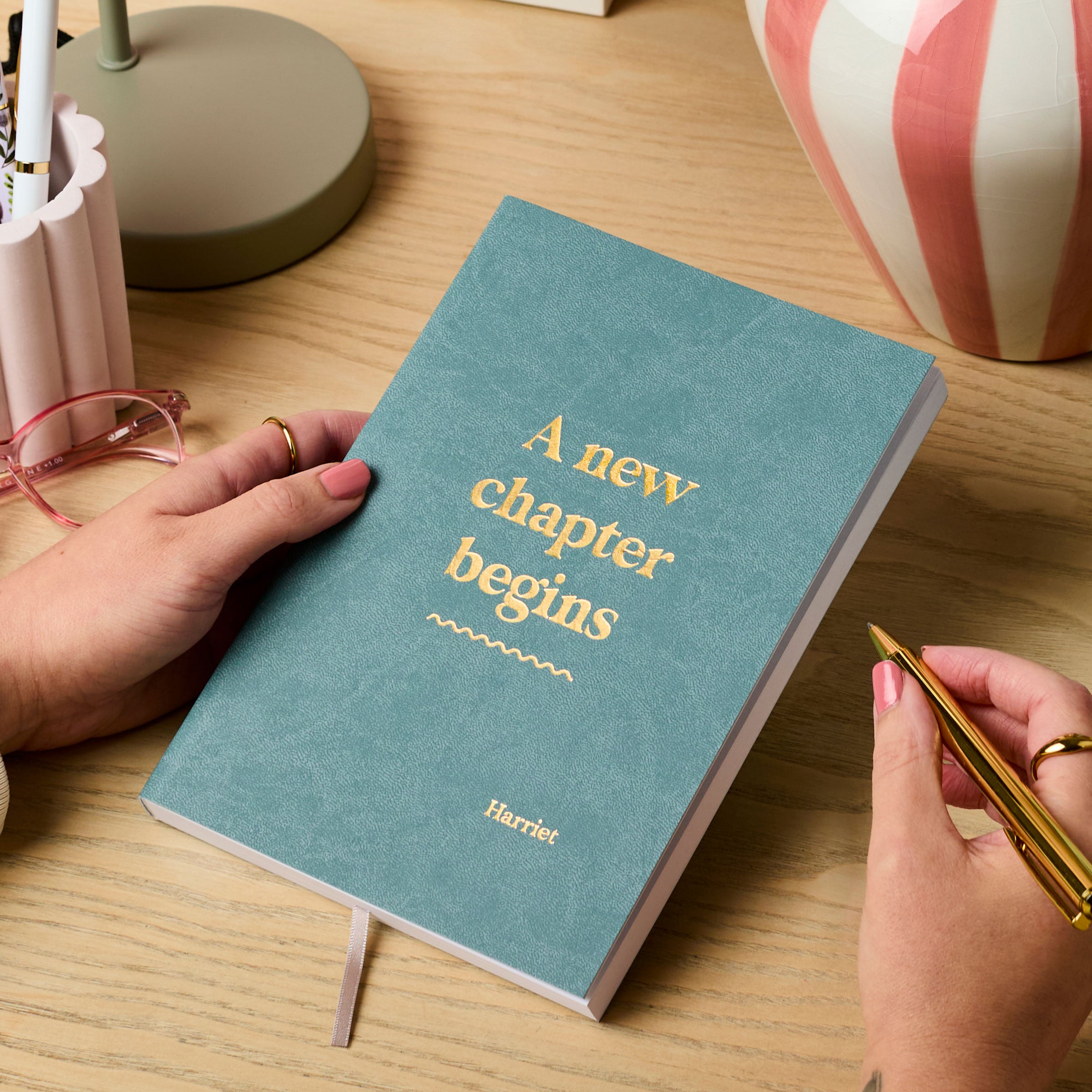 Martha Brook personalised stationery personalised new job gift notebook teal with gold foil on a wooden desk
