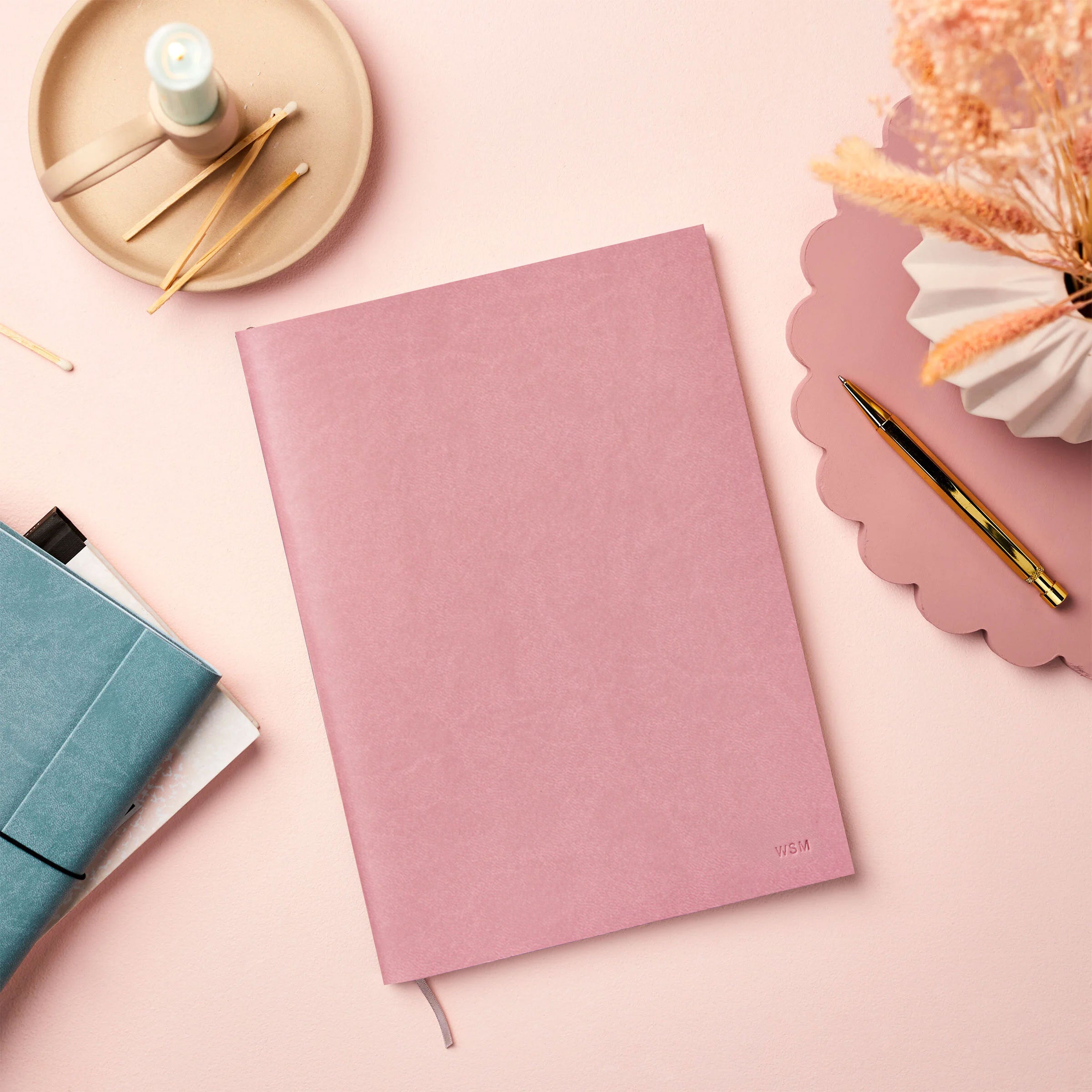 martha brook a4 vegan leather notebook pink vegan leather notebook on a pastel pink background