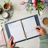 martha brook personalised stationery budget tracker planner on desk with purse and flowers and pen pots