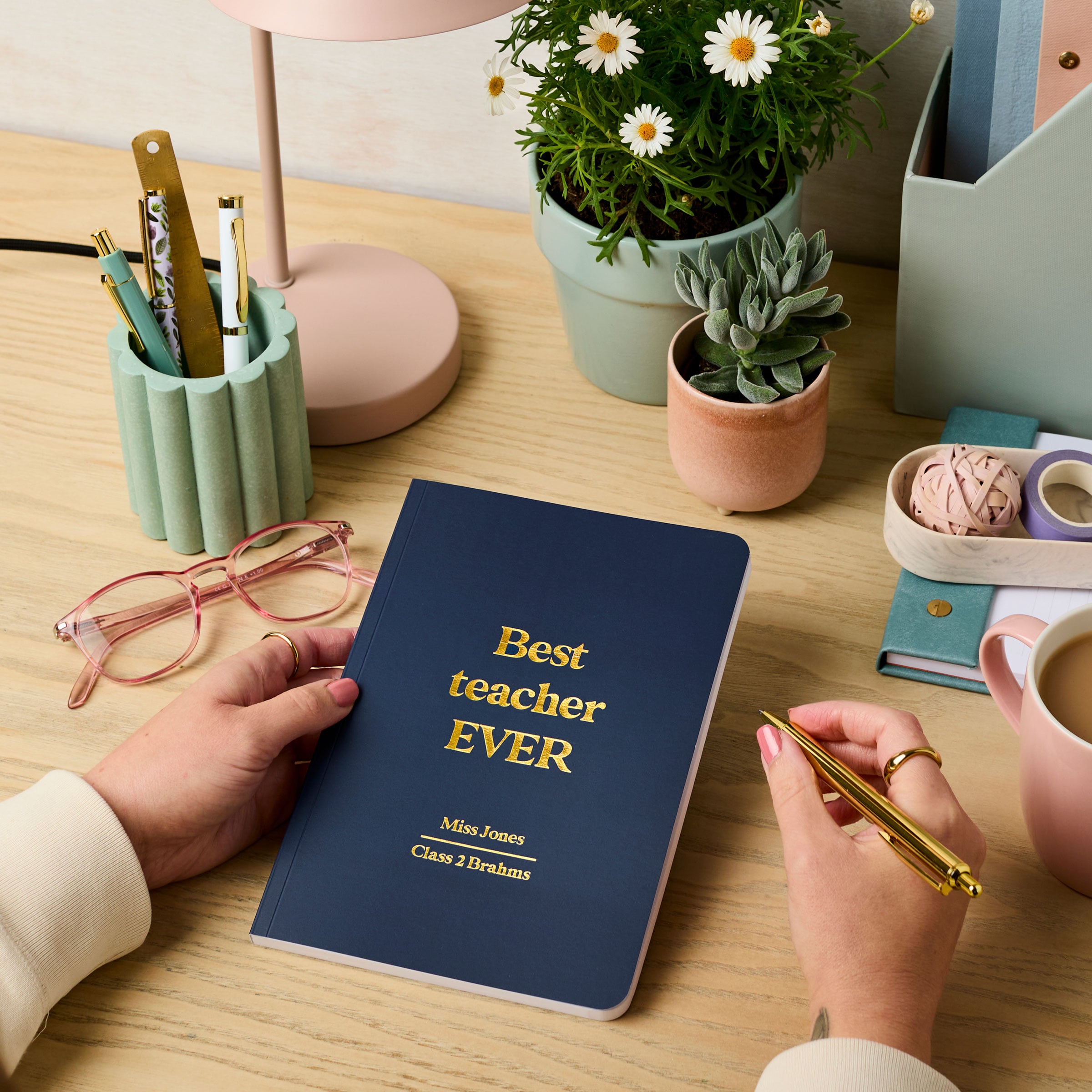 Martha brook personalised stationery personalised teacher gift softback notebook navy with gold foil reading 'best teacher ever'