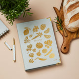 martha-brook-personalised-recipe-journal-and-organiser-on-kitchen-worktop-with-rosemary-and-lemons
