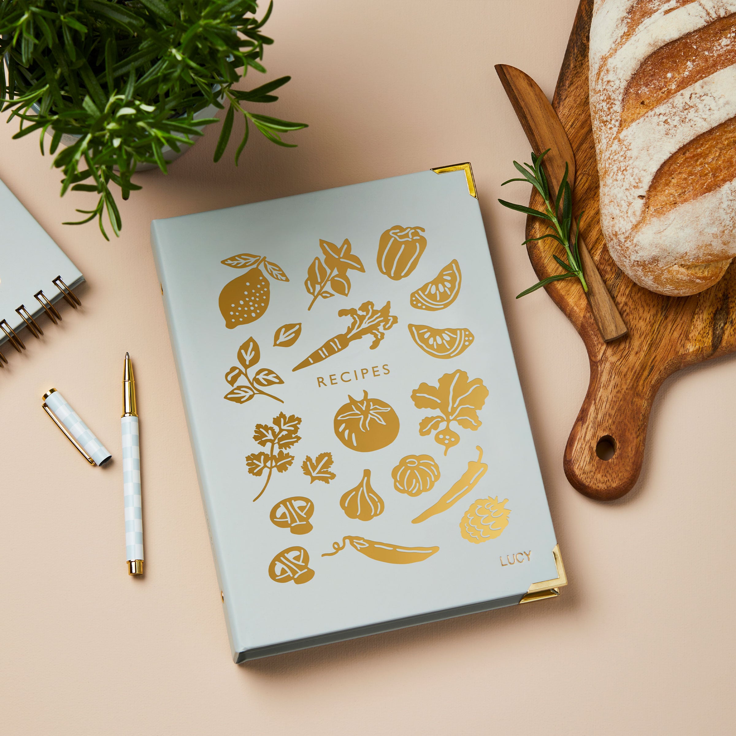 martha-brook-personalised-recipe-journal-and-organiser-on-kitchen-worktop-with-rosemary-and-lemons