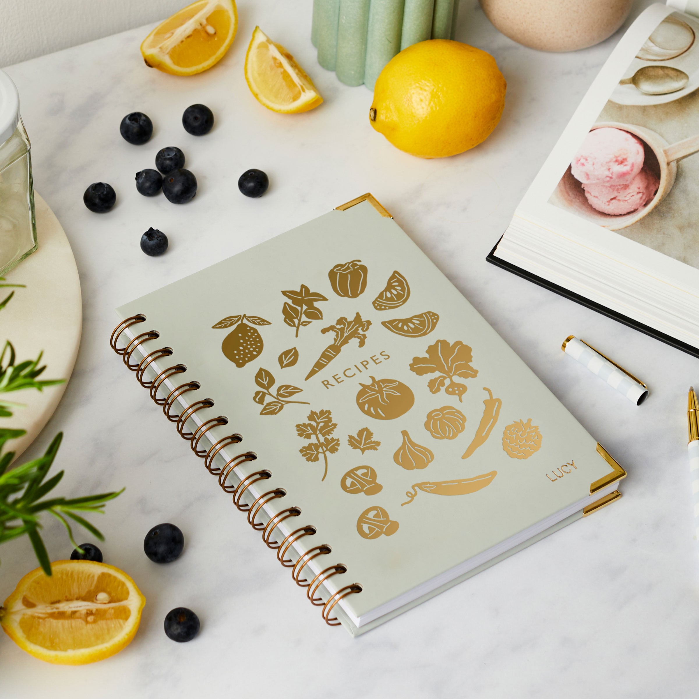martha brook personalised recipe journal on kitchen worktop with bread blueberries and lemons