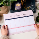 martha brook personalised stationery happiness planning stationery bundle happiness weekly desk pad on a desk main image