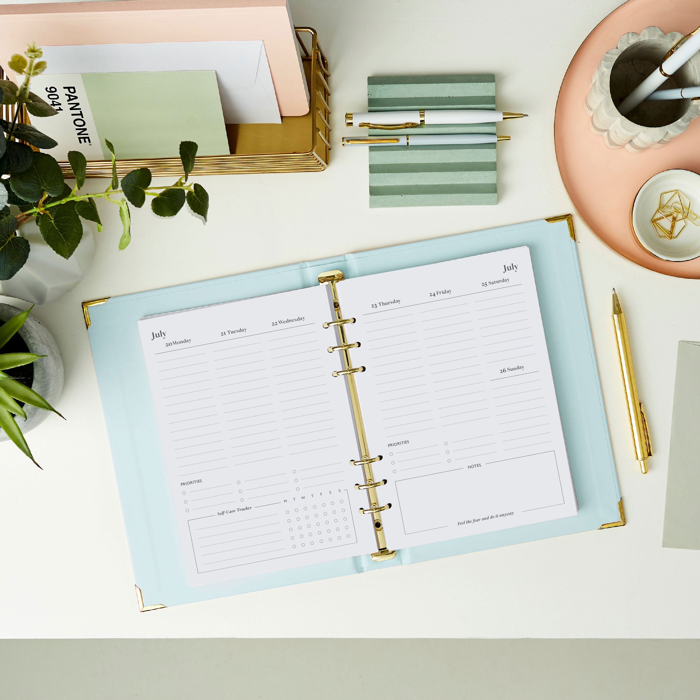 martha brook personalised stationery personalised believe you can life planner inside pages 2026 weekly spread on a desk with a pastel scalloped pen pot and grooved pen holder