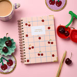 martha brook personalised stationery personalised hardback cherry notebook with cherry coaster and trinket dish on pink background