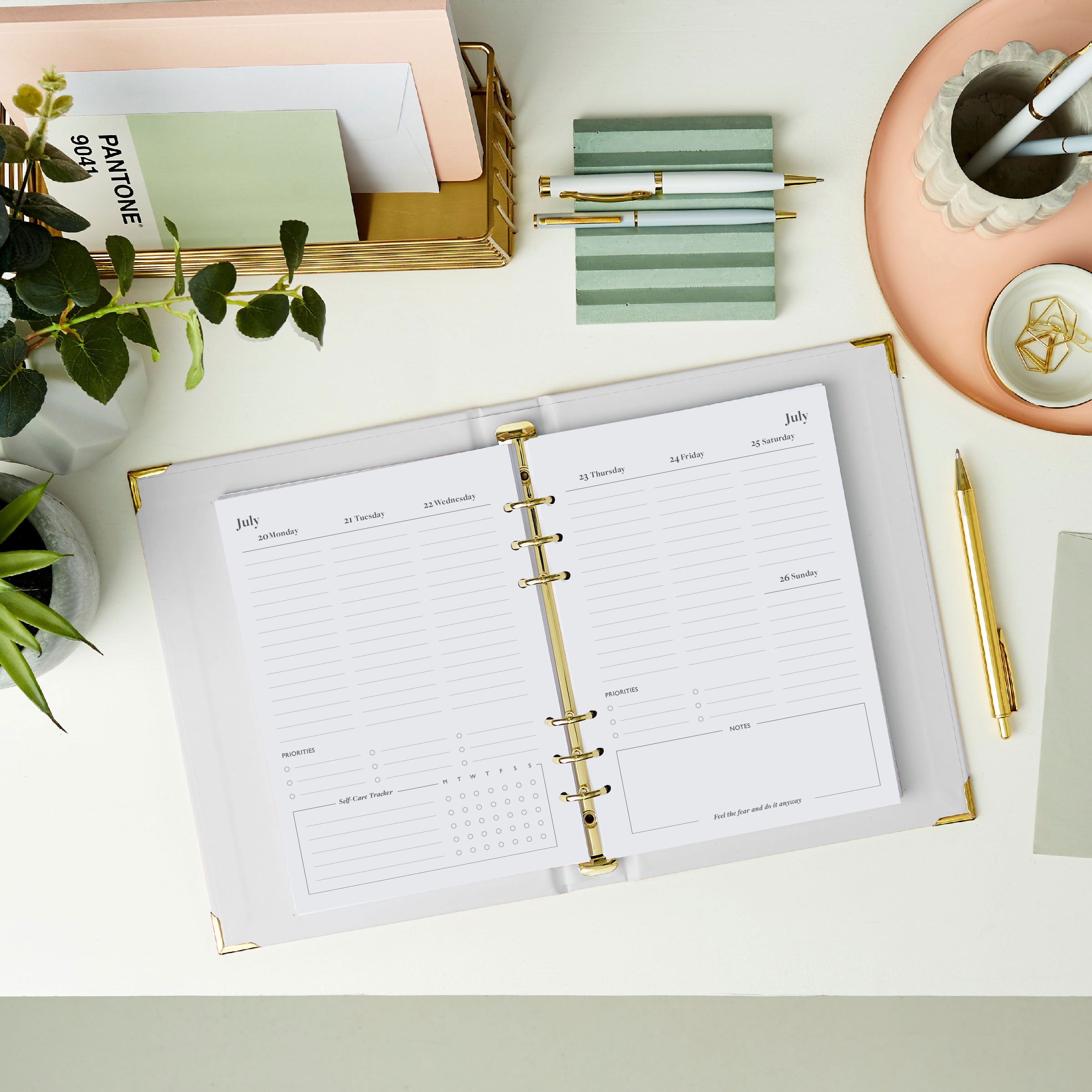 martha brook personalised stationery personalised its all good life planner inside pages 2026 weekly spread on a desk with a pastel scalloped pen pot and grooved pen holder