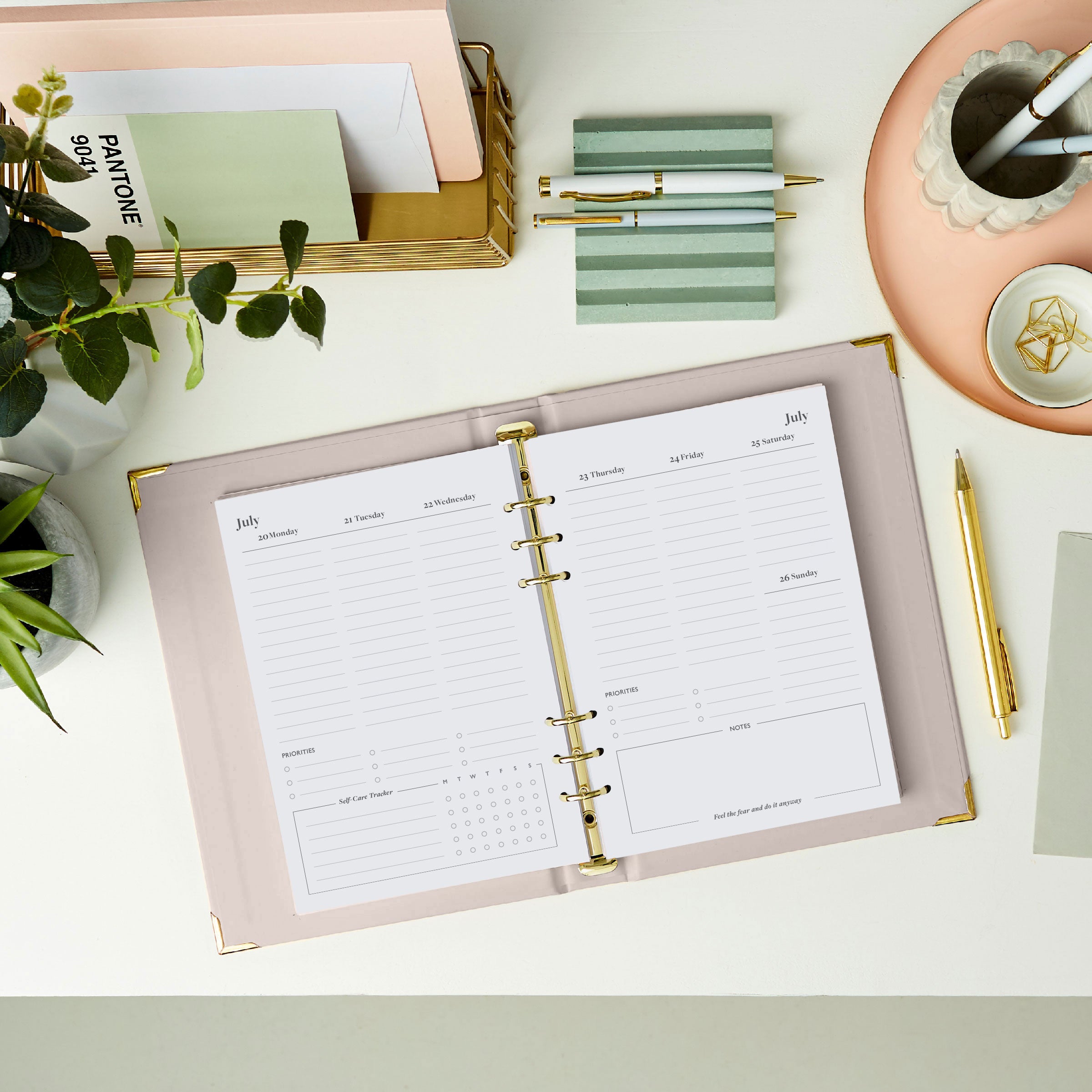 martha brook personalised stationery personalised life planner inside pages 2026 weekly spread on a desk with a pastel scalloped pen pot and grooved pen holder