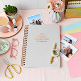 Martha Brook personalised stationery personalised scrapbook gift set scrapbook on desk with polaroid images around it, a roll of washi tape and a gold pen on top