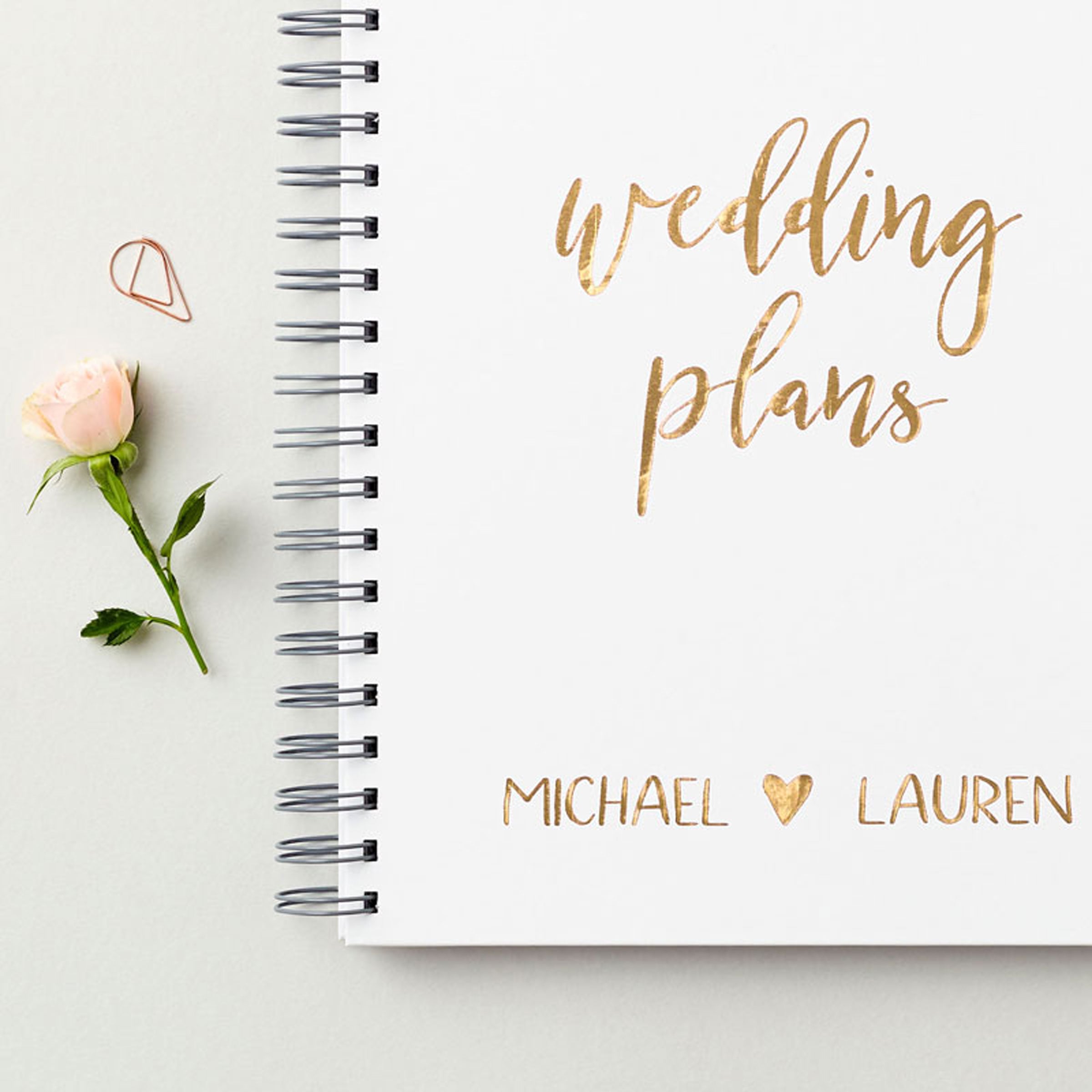 https://www.marthabrook.com/wp-content/uploads/2025/09/martha-brook-personalised-stationery-script-wedding-notebook-in-ivory-white-with-gold-foil.jpg