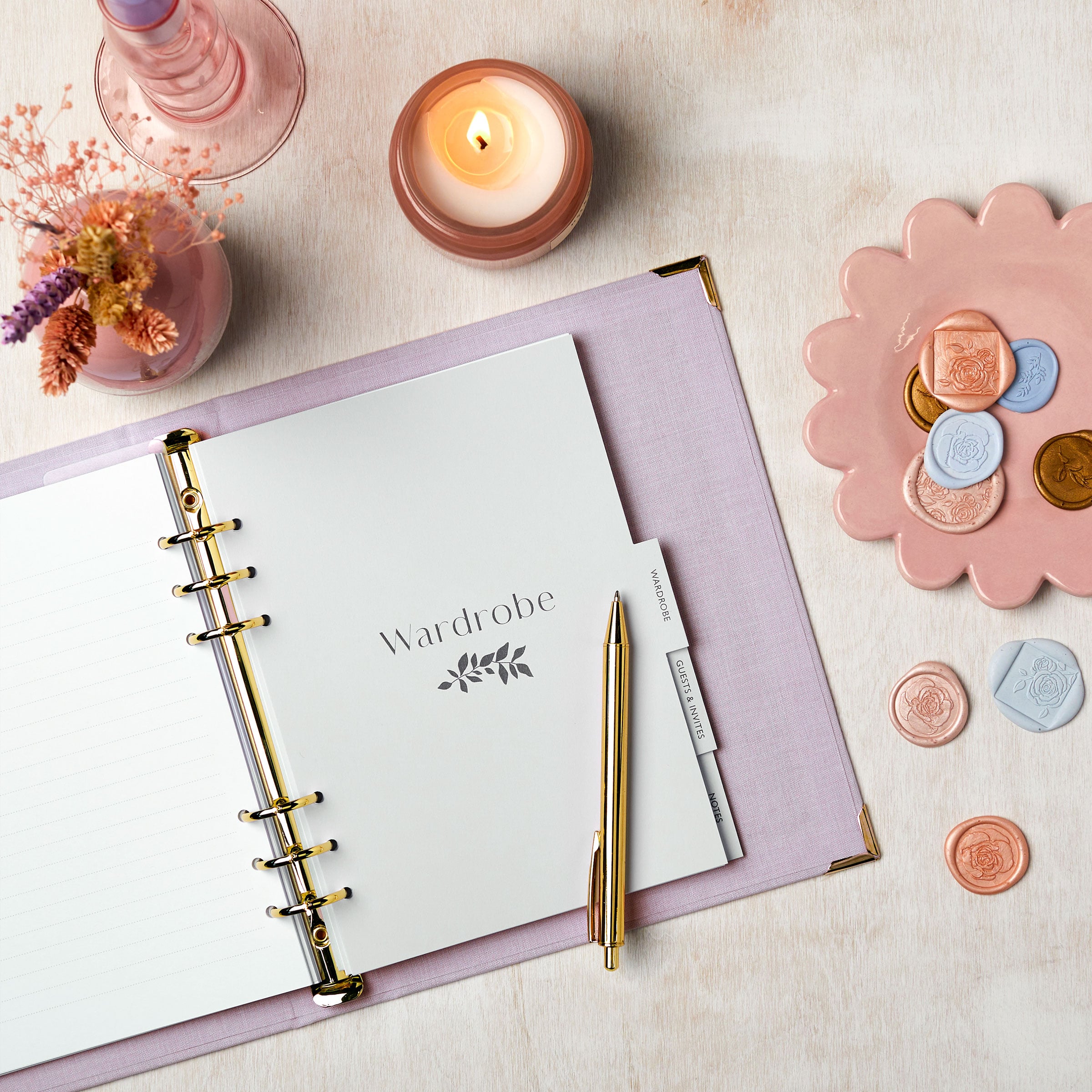 martha brook personalised stationery wedding stationery personalised lilac wedding planner and organiser on table with photos and scissors and ribbons inside contents
