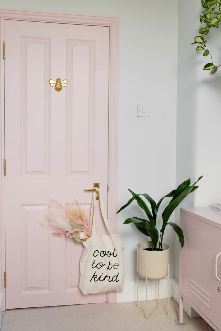 Pink interior office door with bee and cool to be kind tote bag