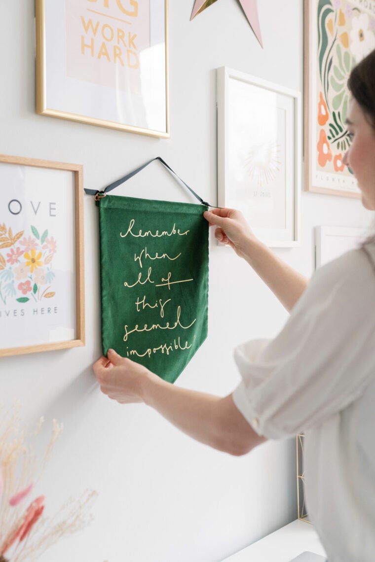 Making a gallery wall, hanging a wall hanging