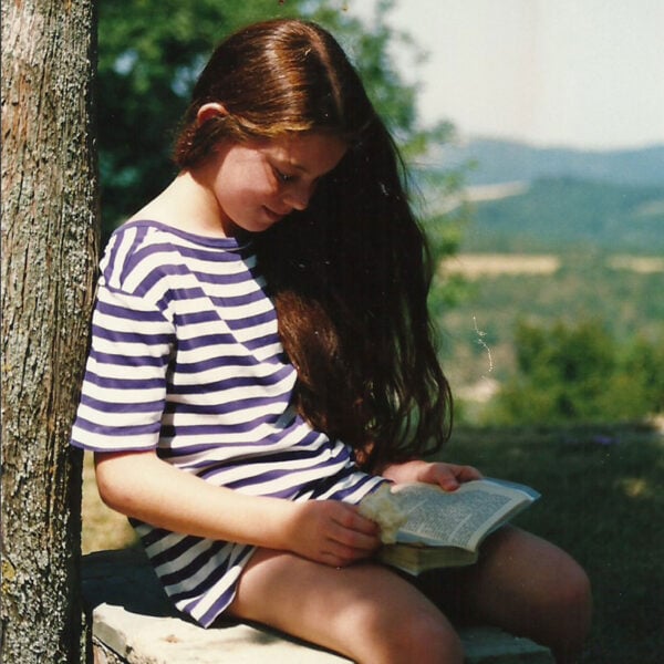 martha brook blog post How Roald Dahl’s Matilda shaped my life Martha reading outside as a child