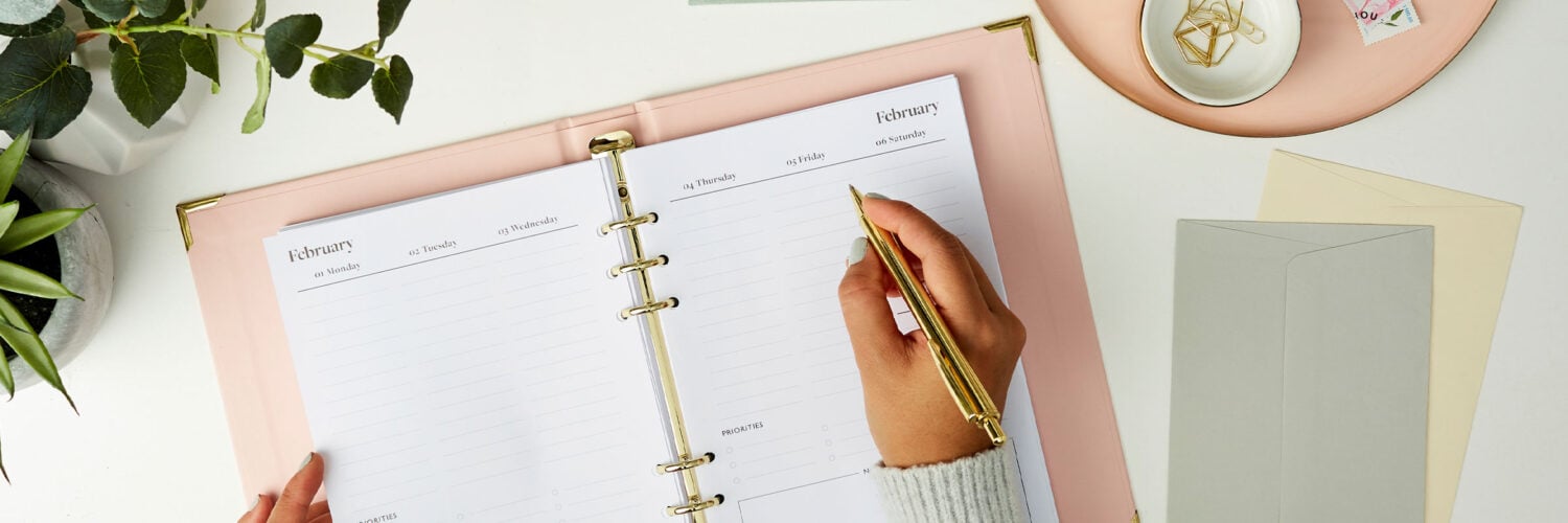martha brook blog post things to do in January life planner being filled in on desk