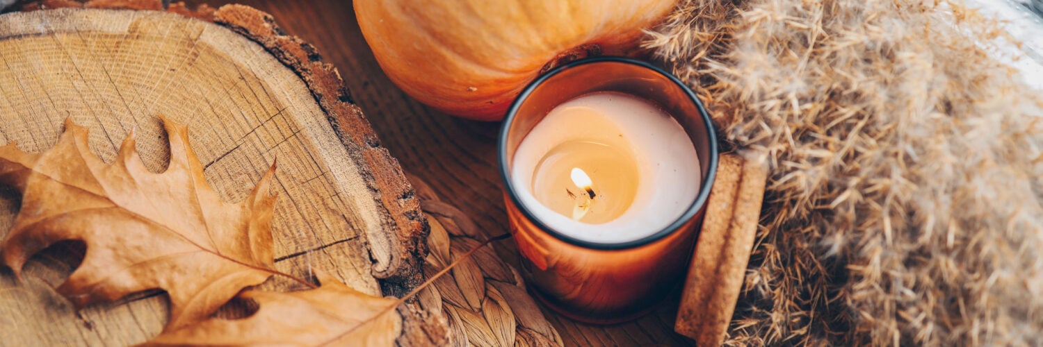 martha brook blog post the best autumn quotes for fall banner with leaves and candle and pumpkin