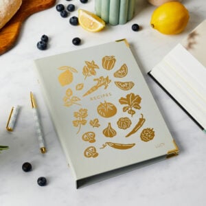 martha brook personalised recipe journal and organiser on kitchen worktop with bread blueberries and lemons