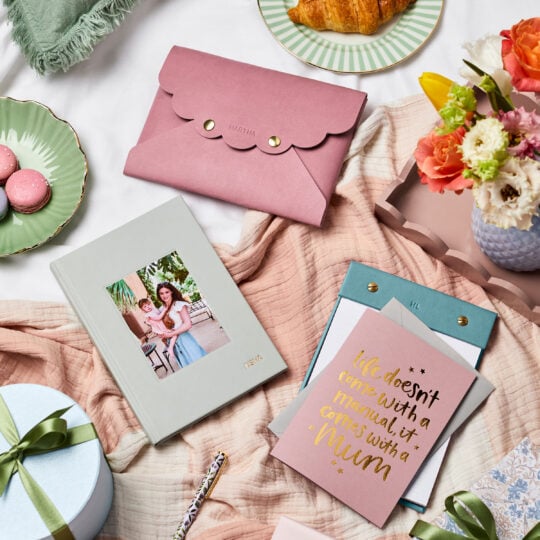 martha brook personalised mothers day vegan leather pouch photo notebook on desk with macarons and gifts