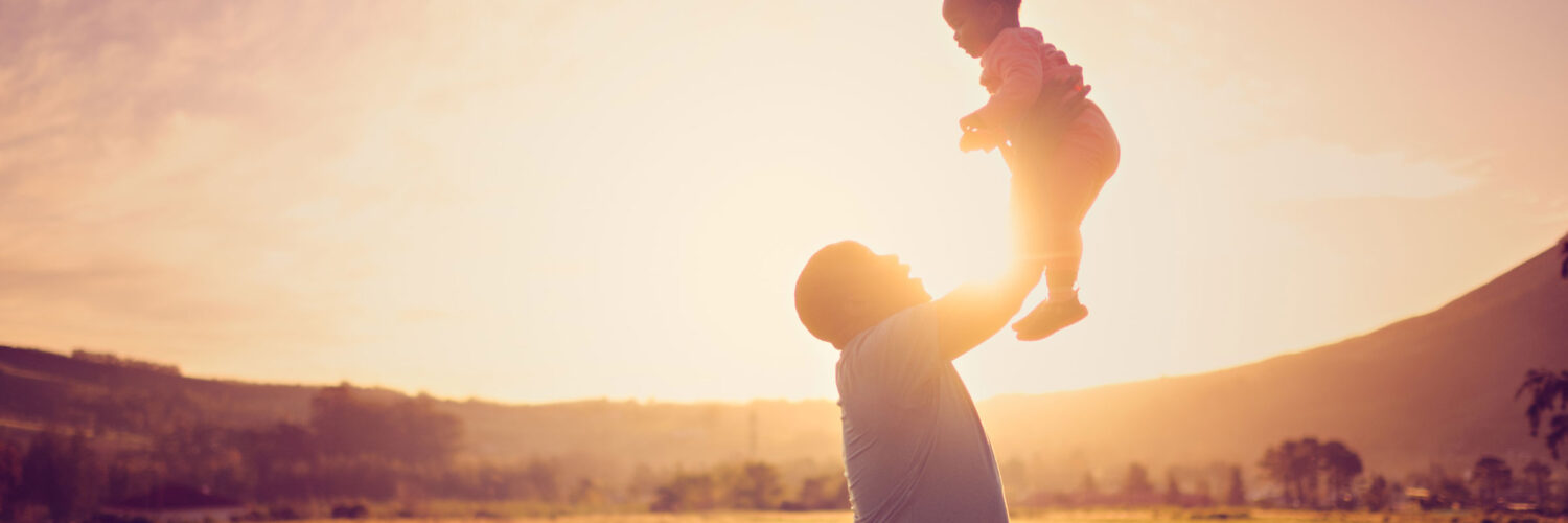 Martha Brook personalised stationery blog 10 memorable gift ideas for dad this father's day dad throwing child up in the air at sunset