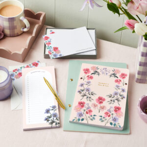 martha brook personalised stationery personalised wild floral gift set on a desk with flowers