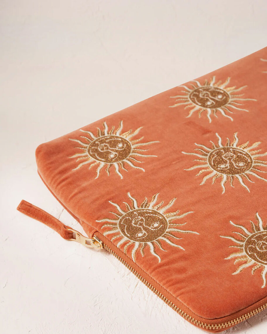 10 dreamy school supplies for grown-ups that give us that back-to-school feeling elizabeth scarlett laptop case orange laptop case embroidered with gold suns, with a gold zip