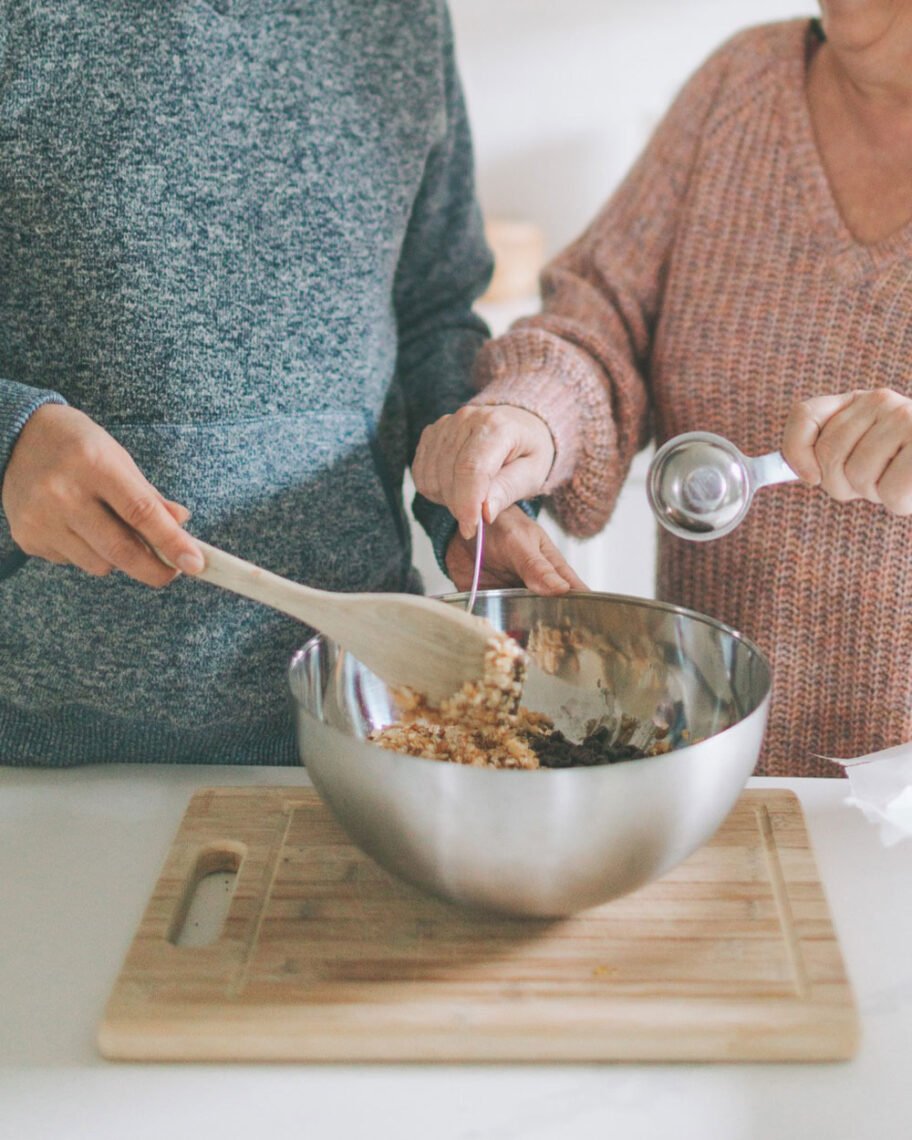 Martha Brook personalised stationery blog 10 ideas for what to get the person who has everything quality time together. Two people with a mixing bowl in front of them baking