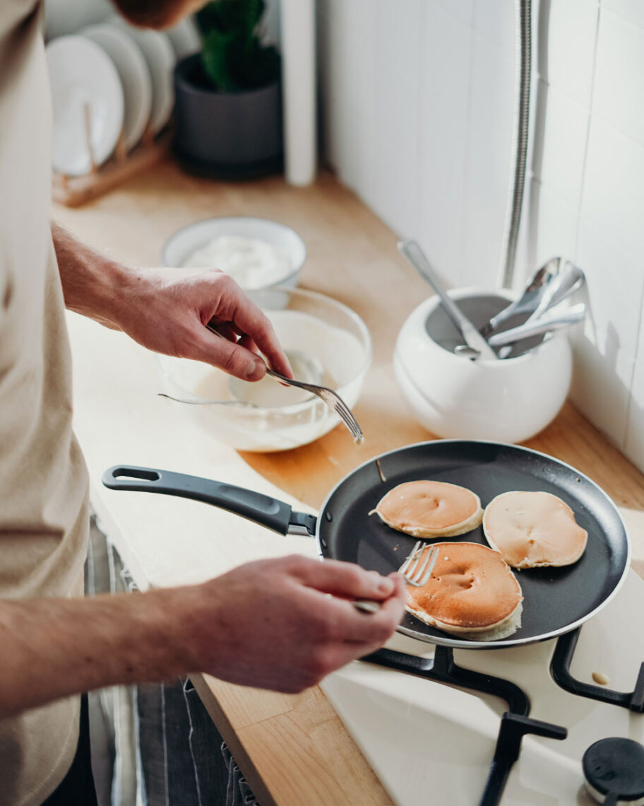 Martha Brook personalised stationery blog Our university essentials and top tips if you’re heading off to study this year person cooking pancakes