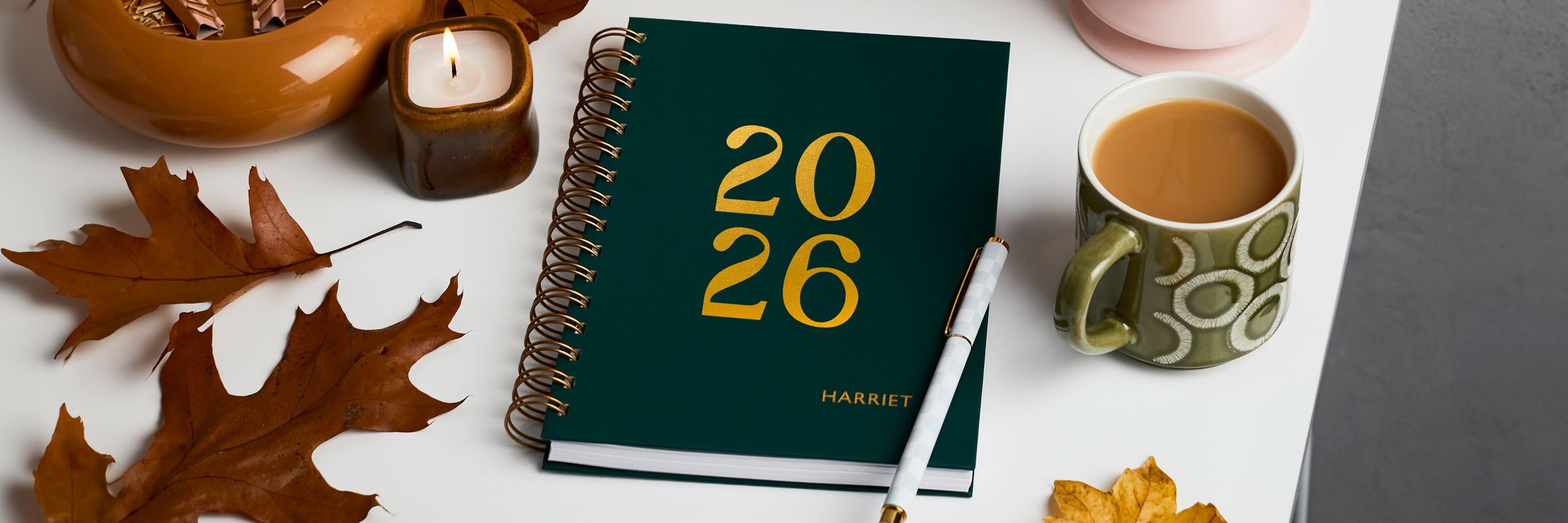 martha brook personalised stationery personalised hardback 2026 diaries category banner. A dark green hardback diary with 2026 embossed on the cover in gold foil