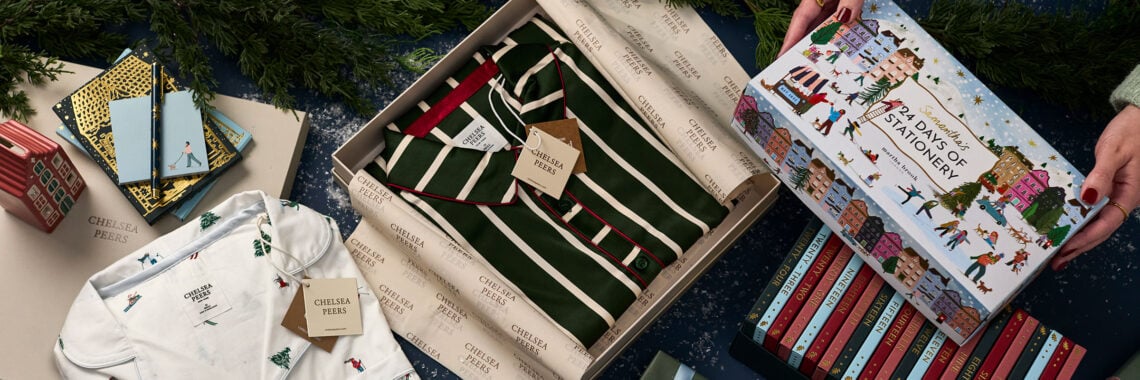 martha brook chelsea peers competition 24 days of stationery advent calendar gift card on table with christmas gifts and snow