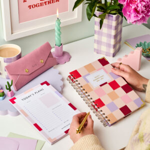 martha brook personalised stationery personalised university stationery bundle 2026 2027 diary desk pad and pencil case on a desk being held in hands